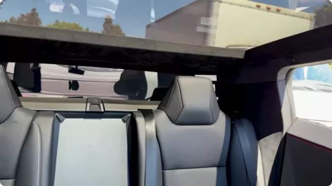 Tesla Cybertruck Interior & Cabin Layout: An Engineering Deep Dive 5 Tesla Cybertruck rear seats layout with flat floor configuration and panoramic glass roof