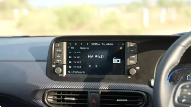 Hyundai Exter Facelift 2026 Review: What Changed? Is It Worth Buying? 2 dashboard features hard robust plastics but the passenger side is styled with a distinct premium texturing to reduce sunlight glare